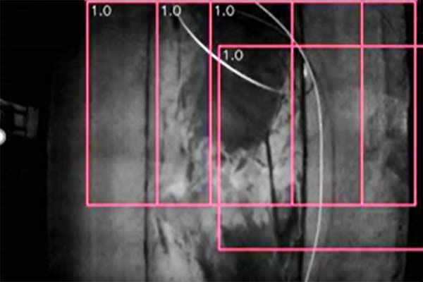 Camera image with multiple mapping boxes analysing the image live at up to 8m/s passing speed